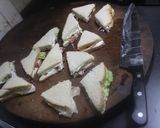 Foto del paso 5 de la receta Triángulos de pan de molde con jamón y queso