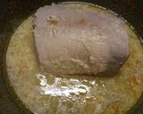 A picture of step 3 of Pork in a creamy artichoke sauce with saffron mash.
