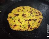 A picture of step 4 of Turnip saag with makki roti.