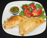 A picture of step 9 of Shrimp, Cheese, and Cilantro Sauce Empanadas.