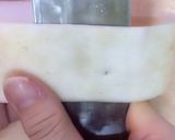 A picture of step 3 of Kouhaku Namasu (Daikon and carrot pickles).