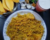 A picture of step 8 of Aloo chane ki tahiri.