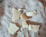 Foto del paso 7 de la receta: Pan con masa madre, alga espirulina, perejil, ajo y queso