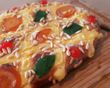 Foto del paso 7 de la receta: Coca de Sant Joan de crema, piñones y frutas confitadas