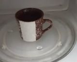 A picture of step 4 of Eggless Chocolate Mug Cake in Microwave.