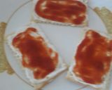 A picture of step 3 of #GA4 WEEK10 Sky flake cracker topped with cream cheese & avocado.