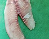 A picture of step 1 of Masala tilapia fish fry.