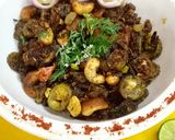 A picture of step 11 of Kaju Karela.
