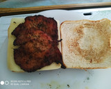 Foto del paso 2 de la receta: Sándwich de filetes adobados de lomo a la plancha con queso