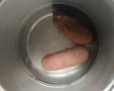 Foto del paso 4 de la receta: Judías pintas con manitas y rabo
