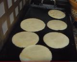 A picture of step 4 of Chicken Tinga Sopes.
