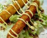 Foto del paso 4 de la receta: Taco de finger de pollo con salsa de mango y curry