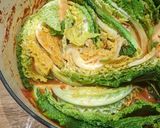 A picture of step 10 of Caramelised Savoy cabbage with tomato and beans.