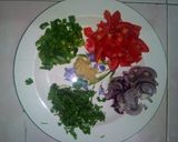 A picture of step 1 of Gizzard with rice and greens.