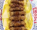 A picture of step 2 of Enoki Roll.