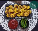 A picture of step 6 of Ratalu Puri (Purple Yam Puri).