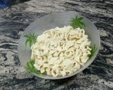 A picture of step 8 of Fresh Noodles with Ragu sauce.