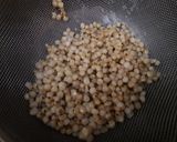 A picture of step 1 of Fried sorghum (juwar).