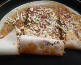 A picture of step 5 of Stuffed French Fries Schezwan Cheese Dosa.