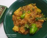 A picture of step 6 of Aloo bengan.