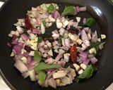 A picture of step 3 of Murungai Keerai Thoran (Drumstick / Moringa Leaves Stir Fry - Kerala style).