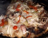 Foto del paso 1 de la receta: Asado, vacío y chuletas de cerdo con tomates rellenos