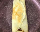 A picture of step 9 of Coconut Jaggery Stuffed Pancakes.