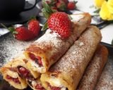 Foto langkah ke 7 dari resep Strawberry Chocolate french Toast Roll ups.
