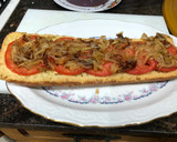 Foto del paso 7 de la receta: Bocadillo de tortilla de patatas con pimiento y cebolla