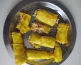 A picture of step 4 of Schezwan cheesy khandvi.