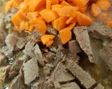 A picture of step 3 of My Tasty Lamb & Veg one Pan served with Garlic Bread.