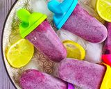 A picture of step 4 of Blueberry Banana Smoothie ice popsicles 💜💜.