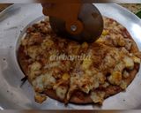 A picture of step 4 of Whole wheat thin crust cheese corn pizza.