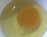 Foto del paso 2 de la receta "Huevos rotos con jamón" en versión avestruz