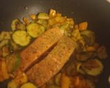 A picture of step 2 of Salmon with courgettes spinach and orange bell pepper.
