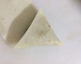 A picture of step 3 of Qeema Samosa |How to Fold a Samosa Perfectly|Homemade Samosas.