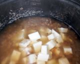 A picture of step 1 of Porridge Beans and Yam.