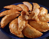 Foto del paso 11 de la receta: Empanadillas de sepia y patata al horno