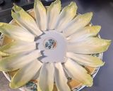 Une image de l'étape 2 de Salade d'endives aux pistaches, abricots secs et tomates séchées.