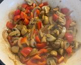 A picture of step 7 of Pork Medallions in a Mushroom and Sherry creamy sauce.