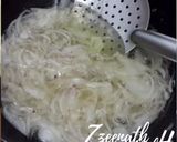 A picture of step 2 of Birista/Deep Fried Sliced Onions.