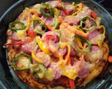 A picture of step 14 of Pepperoncini,bell pepper,easy peel sausage in boboli pizza crust.