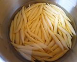 A picture of step 7 of Indonesian traditional cheese sticks (Telor gabus).