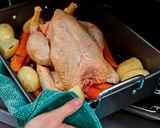 A picture of step 18 of Roast Chicken with Potatoes & Carrots.