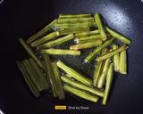 A picture of step 2 of Drumstick Pickle (South Indian).