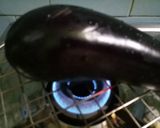 A picture of step 2 of Baingan bharta (smoked eggplant with spices).