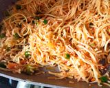 A picture of step 9 of Triple Schezwan fried rice.