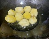 A picture of step 1 of Kashmiri Dum Aloo.