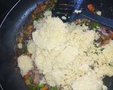 A picture of step 10 of Fried cous cous.