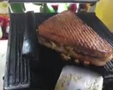 A picture of step 6 of Schezwan grilled cheese sandwich.